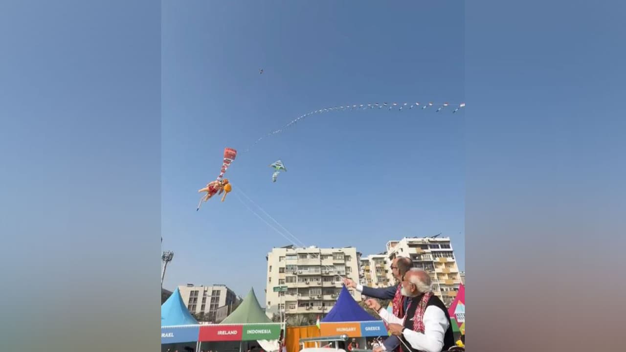 PM Modi, German Chancellor Merz fly kite depicting Lord Hanuman at International Kite Festival (Photo/ANI) PM Modi, German Chancellor Merz fly kite depicting Lord Hanuman at International Kite Festival (Photo/ANI)