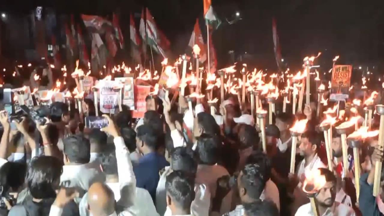 Odisha Youth Congress holds torch rally over exam paper leaks (Photo/ANI) Odisha Youth Congress holds torch rally over exam paper leaks (Photo/ANI)