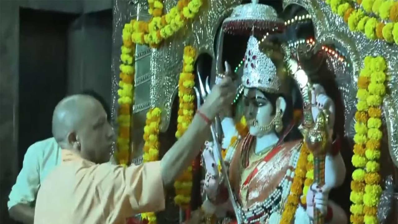 CM Yogi offers prayers at Maa Pateshwari Devi temple in Balrampur (Photo/ANI) CM Yogi offers prayers at Maa Pateshwari Devi temple in Balrampur (Photo/ANI)