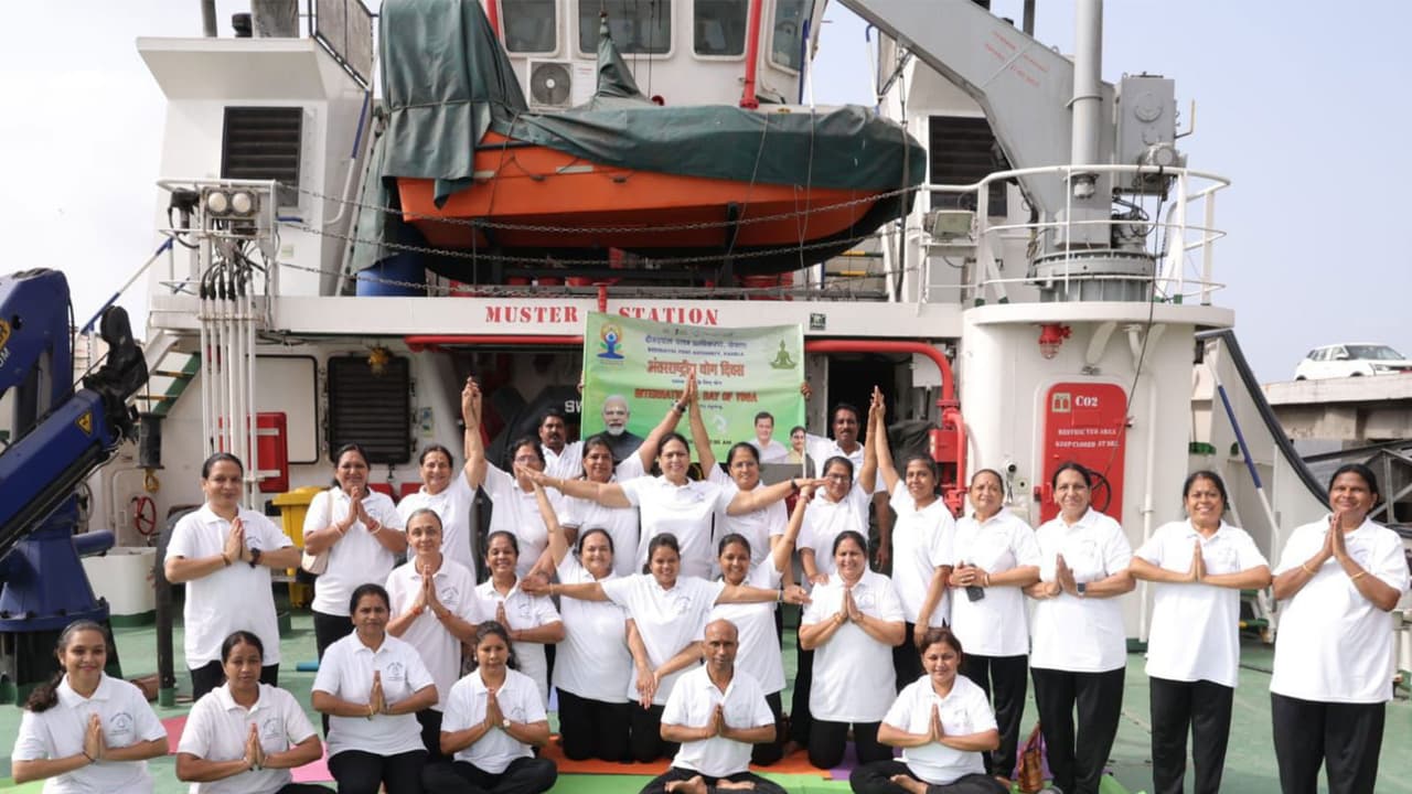 DPA officials and Women Employees Group perform yoga onboard a tug vessel during International Day of Yoga 2026 celebrations at Kandla (Photo/X/@Deendayal_Port) DPA officials and Women Employees Group perform yoga onboard a tug vessel during International Day of Yoga 2026 celebrations at Kandla (Photo/X/@Deendayal_Port)