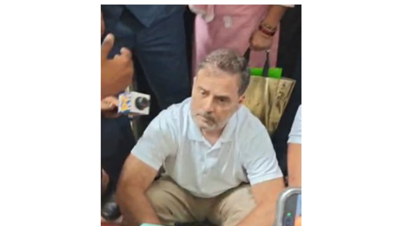 Rahul Gandhi sits in protest outside the Parliament Street Police Station (Photo/ANI) Rahul Gandhi sits in protest outside the Parliament Street Police Station (Photo/ANI)
