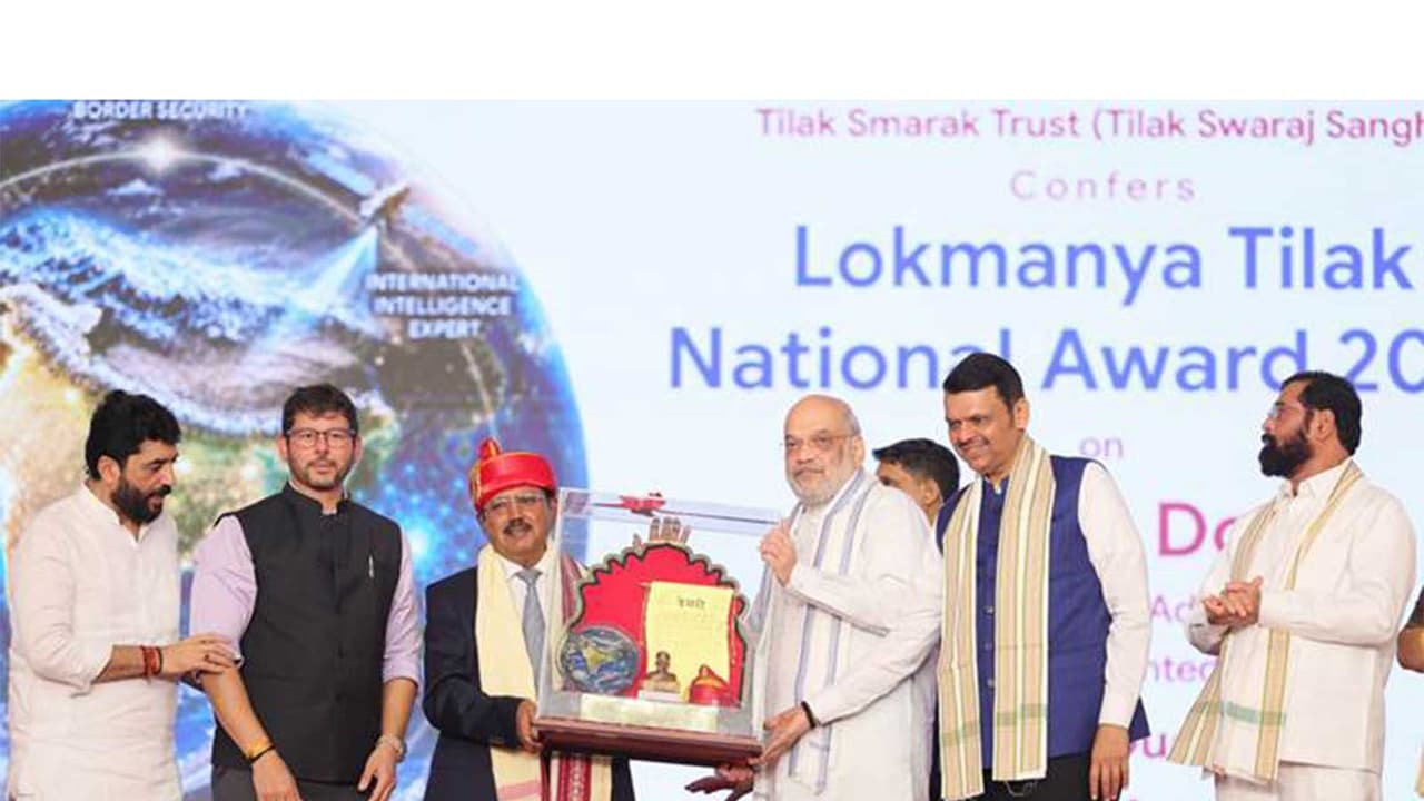 Amit shah confers Lokmanya Tilak National Award 2026 on NSA Ajit Doval (Photo/PIB) Amit shah confers Lokmanya Tilak National Award 2026 on NSA Ajit Doval (Photo/PIB)