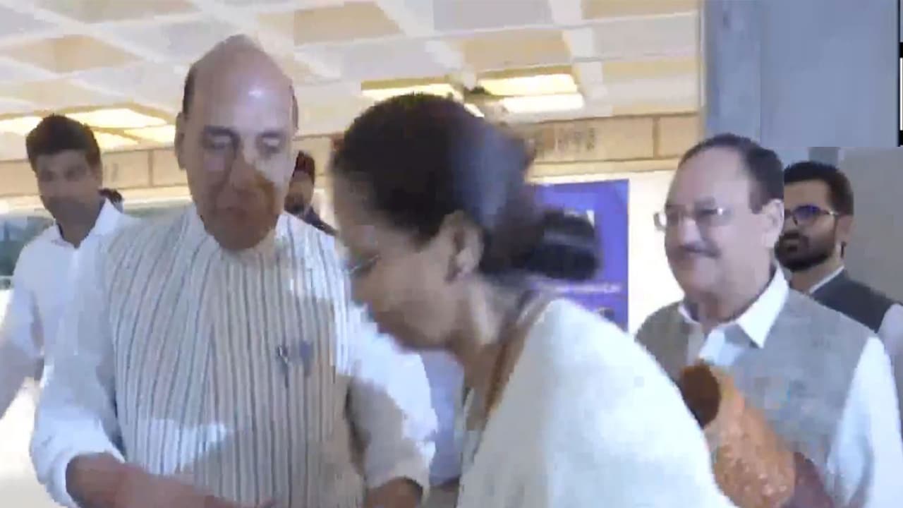 Supriya Sule makes respectful gesture towards Rajnath Singh (Photo/ANI) Supriya Sule makes respectful gesture towards Rajnath Singh (Photo/ANI)