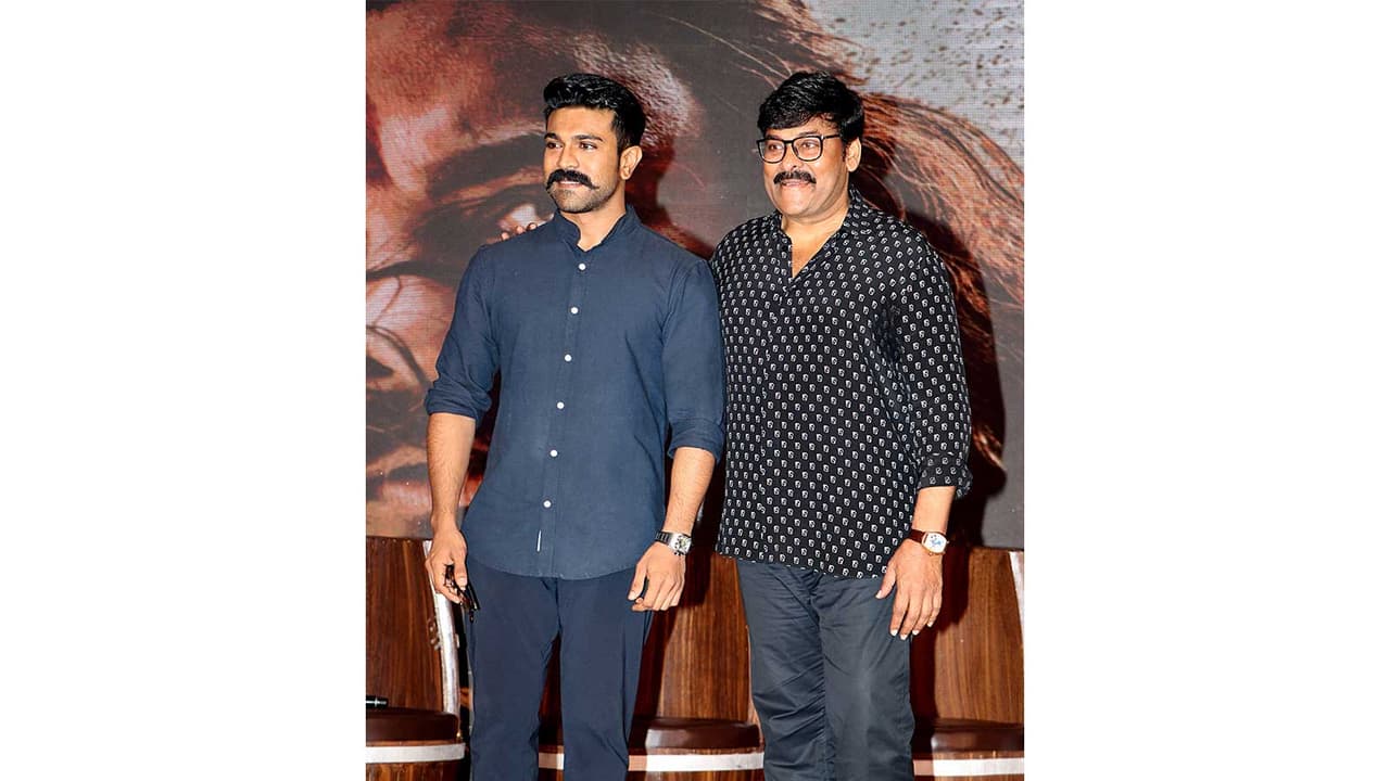 Ram Charan, Chiranjeevi (File photo/ANI) Ram Charan, Chiranjeevi (File photo/ANI)