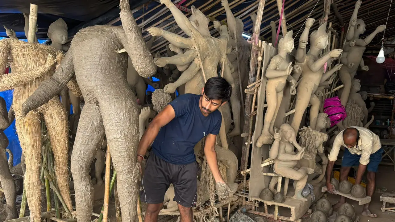 Artisan creating Durga Puja idol (Image source: ANI) Artisan creating Durga Puja idol (Image source: ANI)