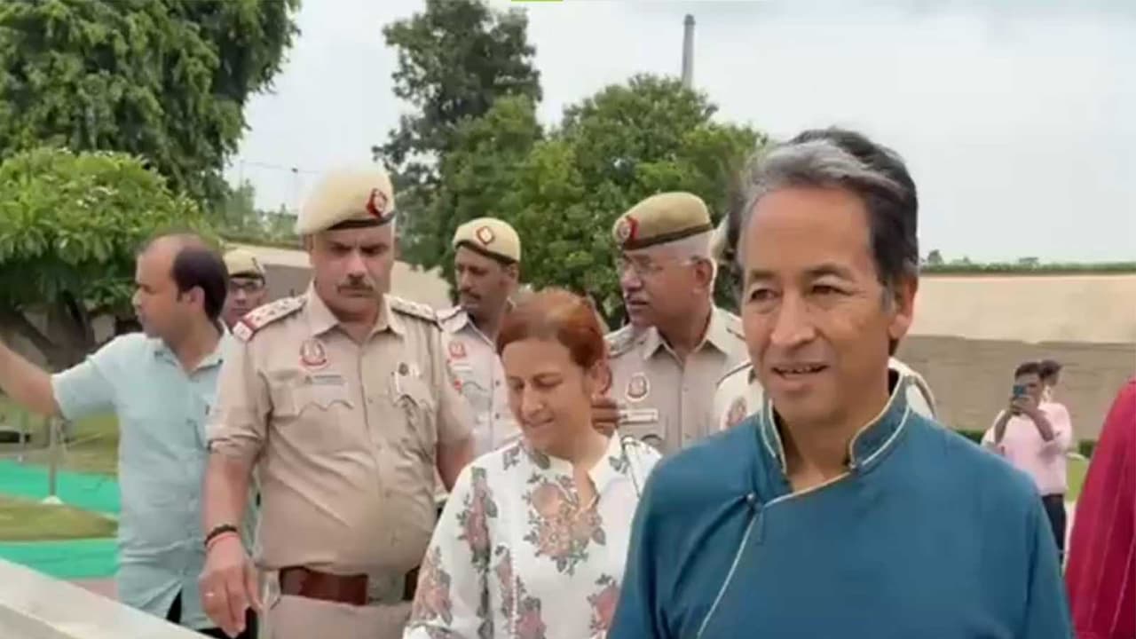 Activist Sonam Wangchuk, along with his wife Gitanjali Angmo, offers tributes at Rajghat (Photo/ANI) Activist Sonam Wangchuk, along with his wife Gitanjali Angmo, offers tributes at Rajghat (Photo/ANI)