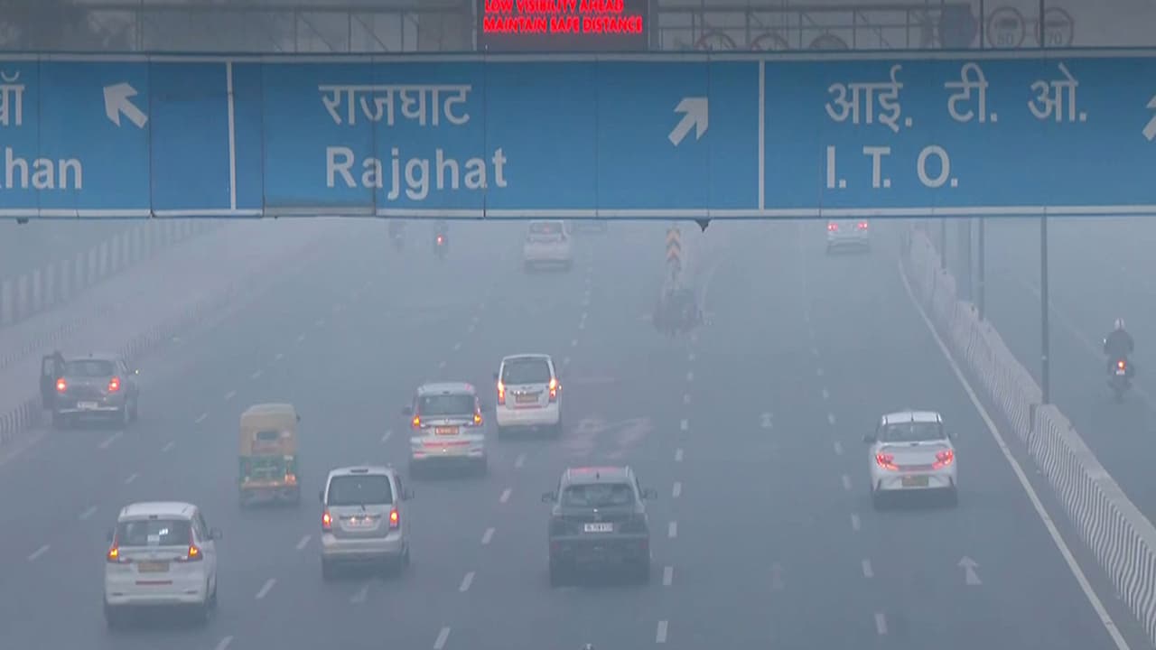 Vehicles move through dense smog in New Delhi (File Photo/ANI) Vehicles move through dense smog in New Delhi (File Photo/ANI)