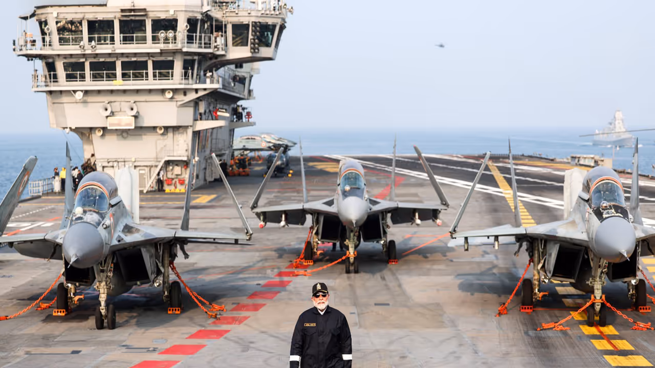 Prime Minister Narendra Modi on the flightdeck of INS Vikrant, with the MiG 29 fighters, in Goa (Photo/ANI)