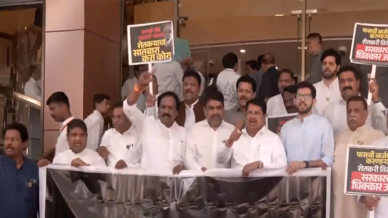 Opposition MLAs protest over farmers' loan waiver issue on first day of Monsoon session (Photo/ANI) Opposition MLAs protest over farmers' loan waiver issue on first day of Monsoon session (Photo/ANI)