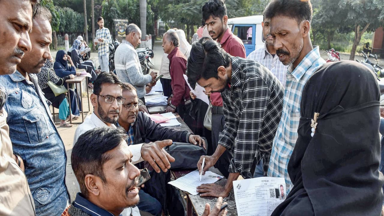 BLOs Collect Enumeration Forms during Special Revision Drive in Prayagraj (Photo/ ANI) BLOs Collect Enumeration Forms during Special Revision Drive in Prayagraj (Photo/ ANI)