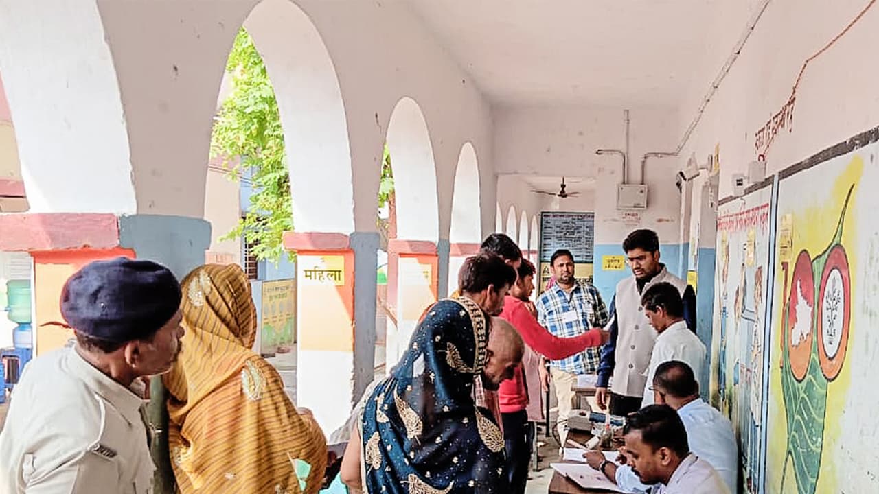 Voters wait in queue to cast their votes for the first phase of the Bihar Assembly elections (File Photo/ANI)