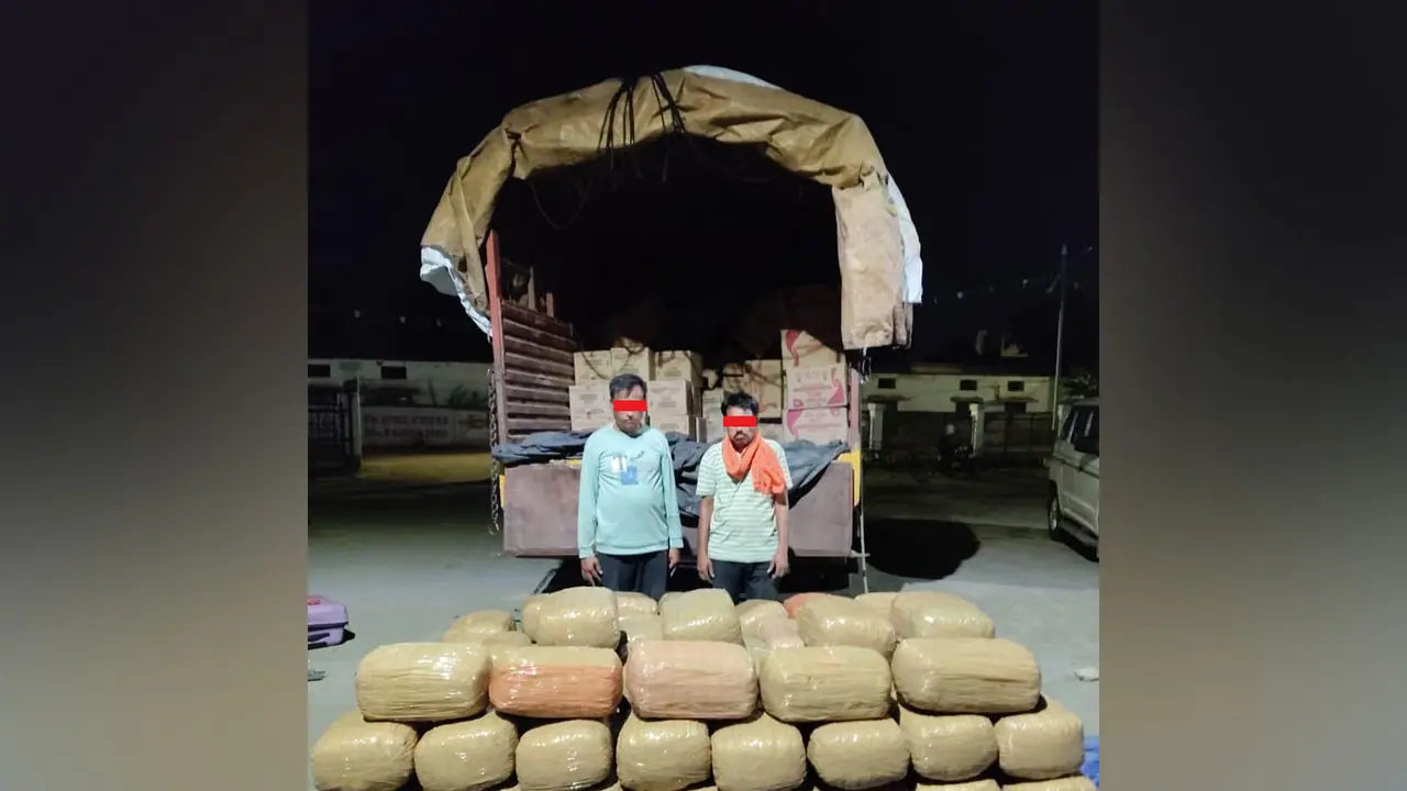 The accused, along with the consignment of the ganja (Photo/NCB) The accused, along with the consignment of the ganja (Photo/NCB)