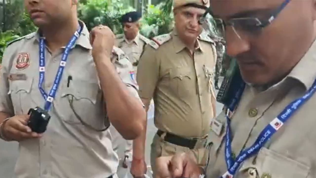 Police personnel use body cams at Jantar Mantar (Photo/ANI) Police personnel use body cams at Jantar Mantar (Photo/ANI)