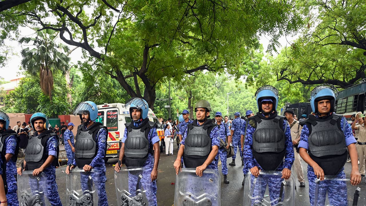 Rapid Action Force (RAF) at Raisina Road, Parliament Street and Jantar Mantar (Photo/ANI) Rapid Action Force (RAF) at Raisina Road, Parliament Street and Jantar Mantar (Photo/ANI)