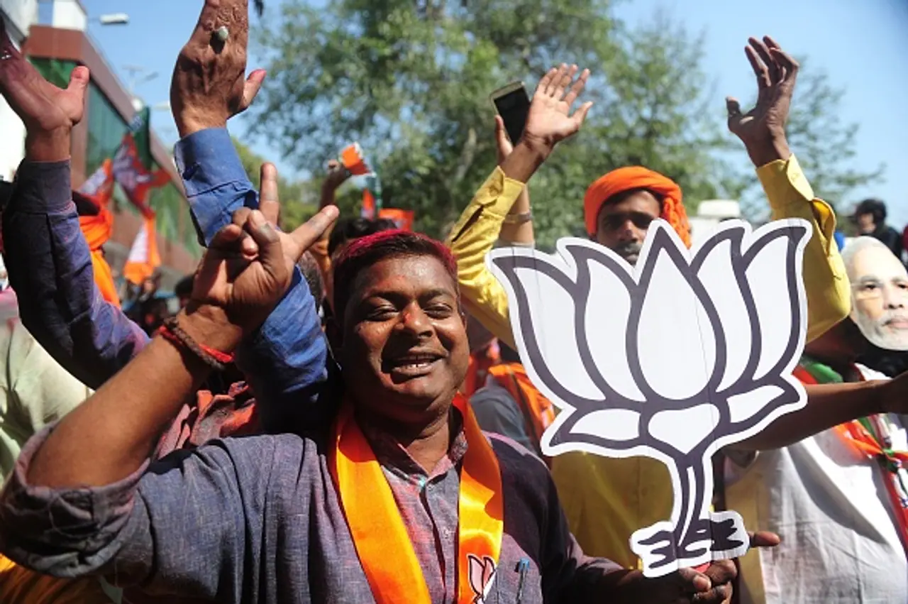 In Pics: Modi wave bring Saffron Holi to Uttar Pradesh In Pics: Modi wave bring Saffron Holi to Uttar Pradesh