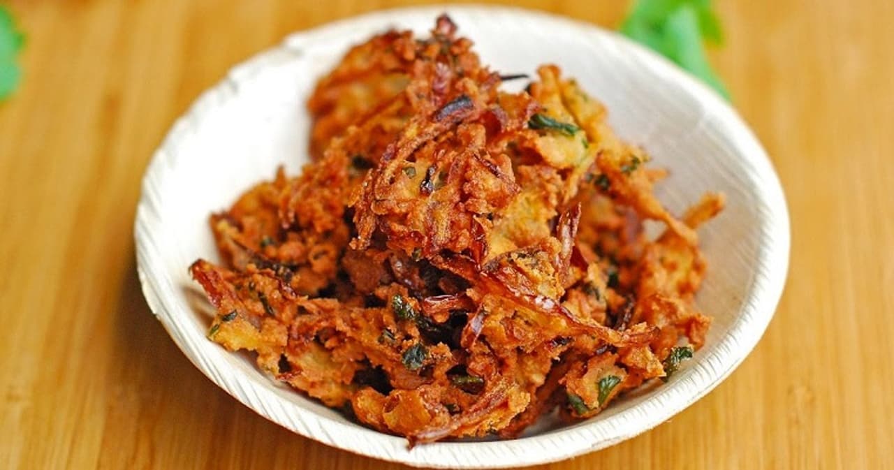 <p><strong>Pakora:</strong> In India, pakora is often considered as an inevitable snack to complement a cup of evening tea. Pakora is often depicted as the single solution to solve problems between people like for instance, a daughter in law can win the heart of her in laws, or makeup with her friends by offering pakoras as a peace offering. However, it also has the capacity to destroy your body. Pakoras are addictive, which can make people obese and decrease good cholesterol.<br /> </p> <p><strong>Pakora:</strong> In India, pakora is often considered as an inevitable snack to complement a cup of evening tea. Pakora is often depicted as the single solution to solve problems between people like for instance, a daughter in law can win the heart of her in laws, or makeup with her friends by offering pakoras as a peace offering. However, it also has the capacity to destroy your body. Pakoras are addictive, which can make people obese and decrease good cholesterol.<br /> </p>