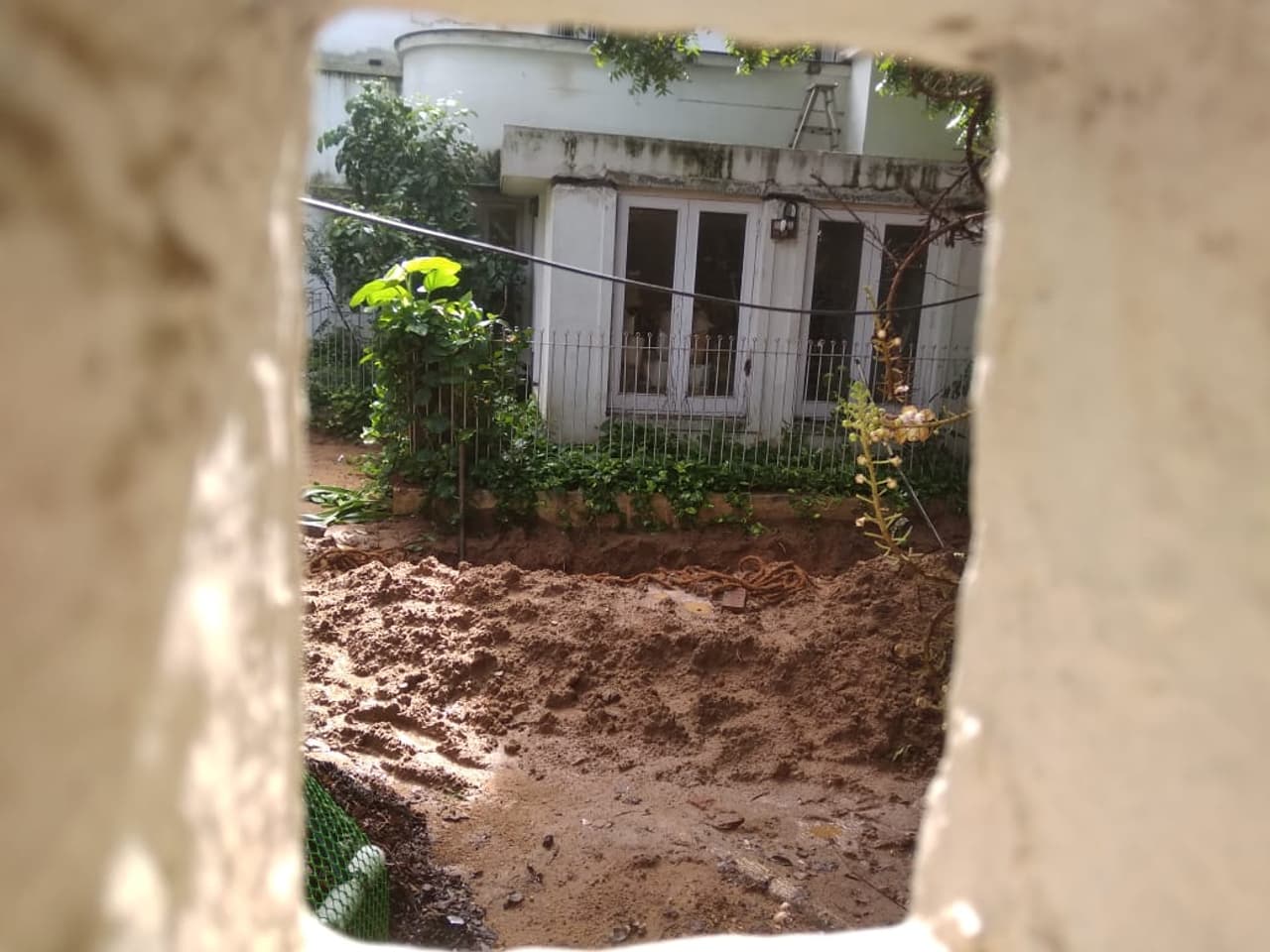 idols and artefacts buried on the grounds of a guest house in tony Poes Garden