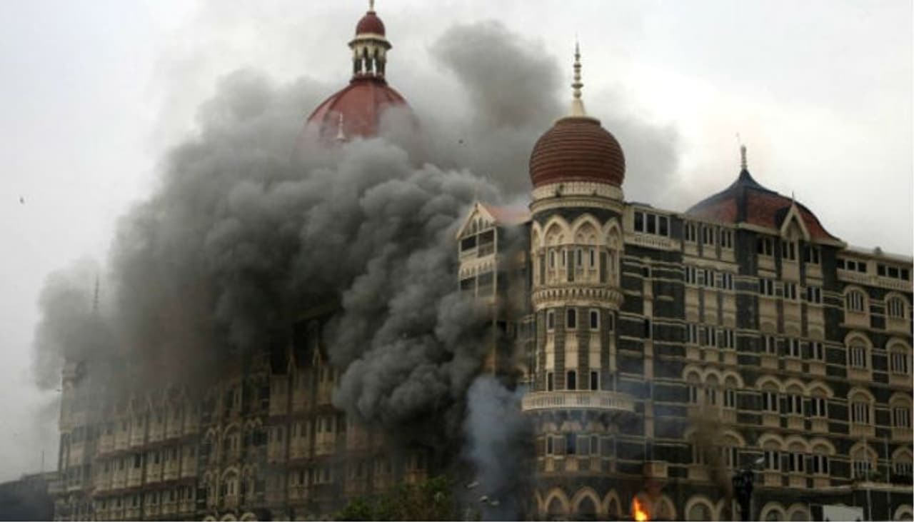 On Monday, India marks the 10th anniversary of the 26/11 terror attacks on Mumbai, which left 166 people dead and over 300 injured. This picture shows smoke and flames billowing out from the Taj Mahal hotel, which was one of the places that were attacked by the Lashkar e Taiba terrorists.