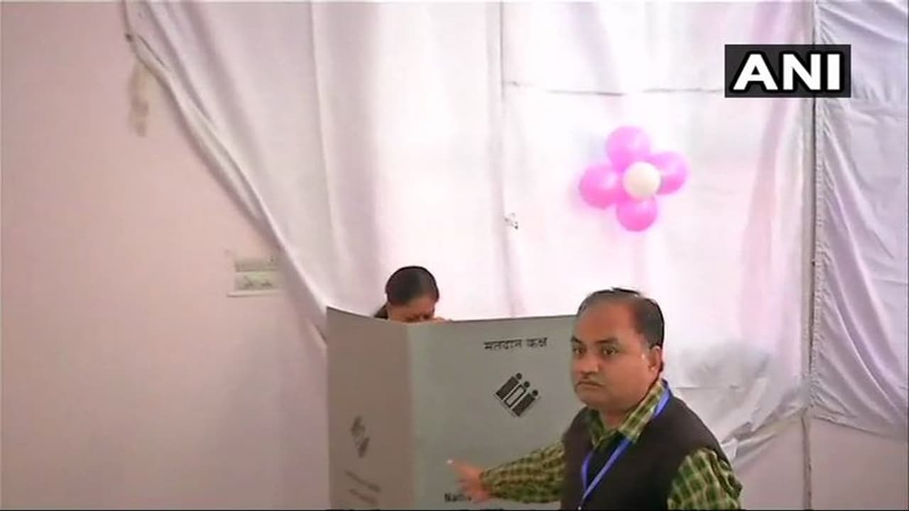 Rajasthan chief minister Vasundhara Raje casts her vote at polling booth no. 31A in Jhalrapatan constituency of Jhalawar. Voting has begun in Telangana and Rajasthan for 119 and 199 Assembly constituencies respectively amid tight security on Friday.