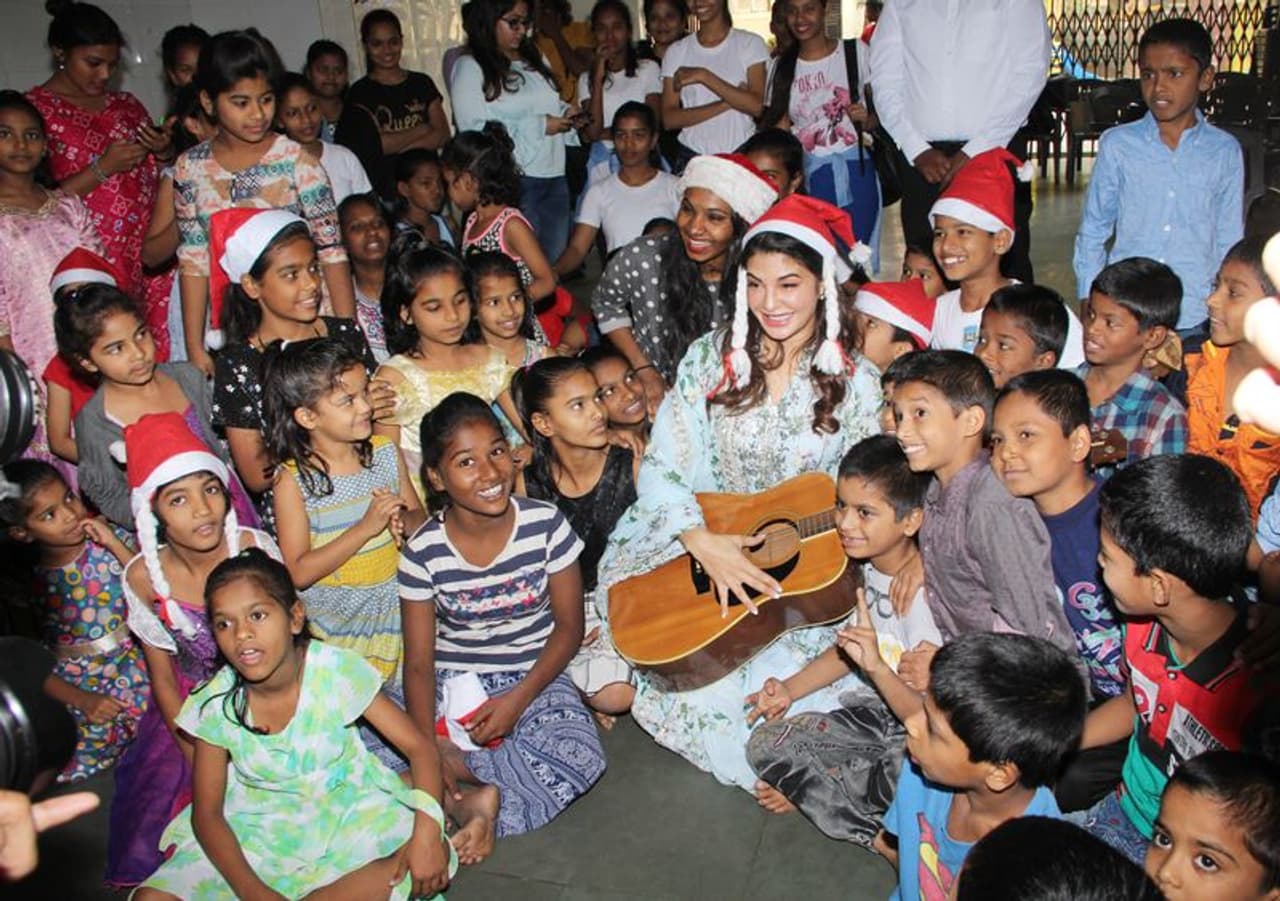 Aishwarya Rai Bachchan, Jacqueline Fernandez and Chitrangada Singh celebrate Christmas with kids making their celebrations special. While Aishwarya celebrates with cancer survivors, Chitrangada is having fun with NGO kids.