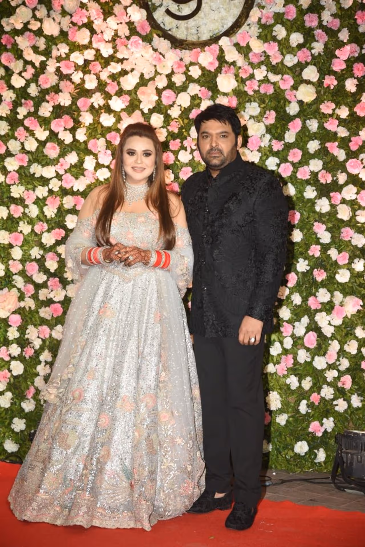 Kapil Sharma got married to his fiancee, Ginni Chatrath on December 12 in Jalandhar. He tied the knot as per both Hindu and Sikh rituals. Post his wedding, he also hosted a wedding reception for his close friends and family in Amritsar. Kapil Sharma hosted their second wedding reception in Mumbai's JW Marriott hotel on Monday evening. The bash was attended by the likes of Krushna Abhishek, Bharti Singh, Anil Kapoor among others. Take a look Kapil Sharma got married to his fiancee, Ginni Chatrath on December 12 in Jalandhar. He tied the knot as per both Hindu and Sikh rituals. Post his wedding, he also hosted a wedding reception for his close friends and family in Amritsar. Kapil Sharma hosted their second wedding reception in Mumbai's JW Marriott hotel on Monday evening. The bash was attended by the likes of Krushna Abhishek, Bharti Singh, Anil Kapoor among others. Take a look