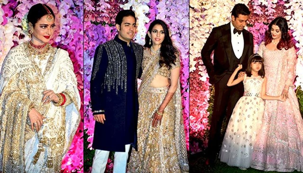 Celebrities and politicians arrived at the Jio World Complex in Mumbai for a post wedding celebration for Akash Ambani and Shloka Mehta who were married in a glittering ceremony on Saturday, March 09. Bollywood stars Amitabh Bachchan, Rekha, Akshay Kumar and wife Twinkle Khanna, Juhi Chawla, Aishwarya Rai Bachchan and Abhishek Bachchan, with their daughter Aaradhya, cricket legend Sachin Tendulkar and his wife Anjali Tendulkar, musician Anu Malik and his family are among those who were seen at the event. Check out the pictures here. (Picture Courtesy: Yogen Shah)
