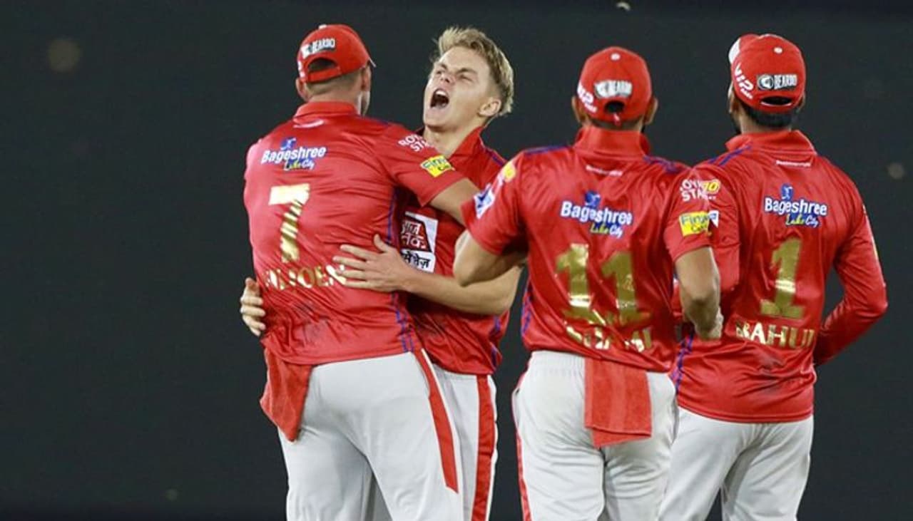 Left arm paceman Sam Curran took a hat trick as Kings XI Punjab (KXIP) pulled off a 14 run win over Delhi Capitals (DC) in an Indian Premier League (IPL) 2019 match in Mohali on Monday night. Curran is seen here celebrating his hat trick with teammates.