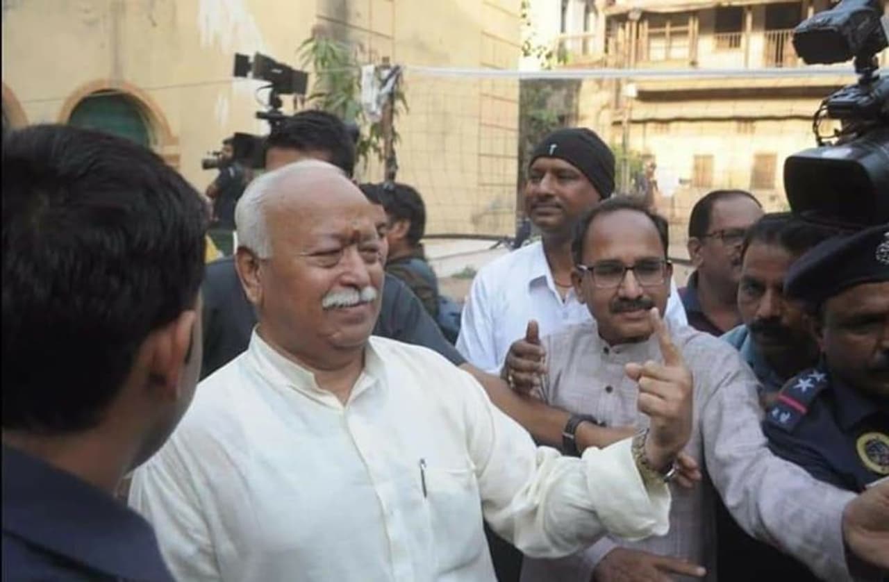 RSS Top brass including Mohan Bhagwat voted at Nagpur. RSS Top brass including Mohan Bhagwat voted at Nagpur.