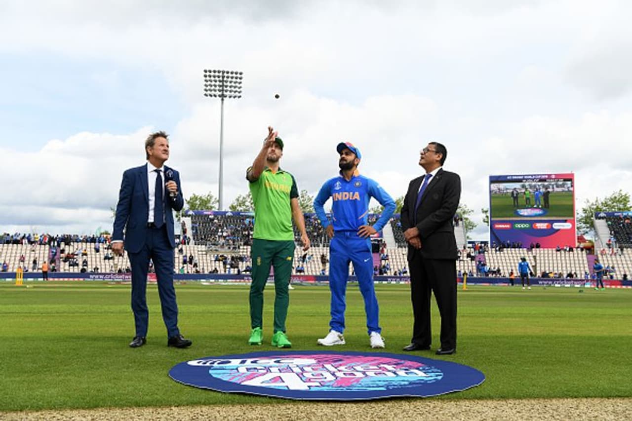Captains Faf du Plessis (South Africa) and Virat Kohli (India) at the toss during their ICC World Cup match in Southampton. Also seen are TV commentator Mark Nicholas (left) and match referee Ranjan Madugalle
