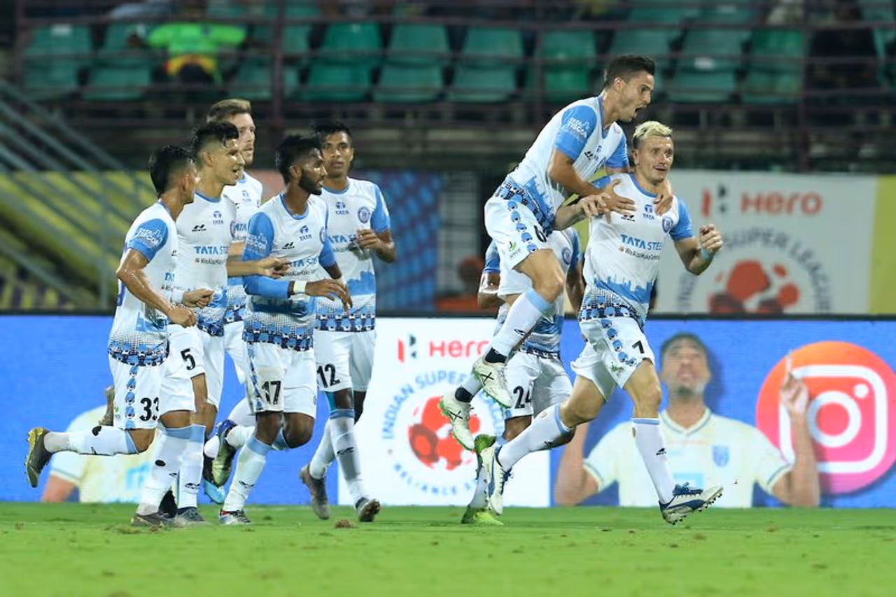 <p>In what was another nail biting encounter, Jamshedpur FC earned a hard fought 1 0 win over NorthEast United in the ongoing Indian Super League (ISL), at the Tilka Maidan in Goa, on Friday. The victory handed NEU their first loss of the season, as they stayed at the fourth spot, while Jamshedpur have risen to fifth.</p> <p>In what was another nail biting encounter, Jamshedpur FC earned a hard fought 1 0 win over NorthEast United in the ongoing Indian Super League (ISL), at the Tilka Maidan in Goa, on Friday. The victory handed NEU their first loss of the season, as they stayed at the fourth spot, while Jamshedpur have risen to fifth.</p>