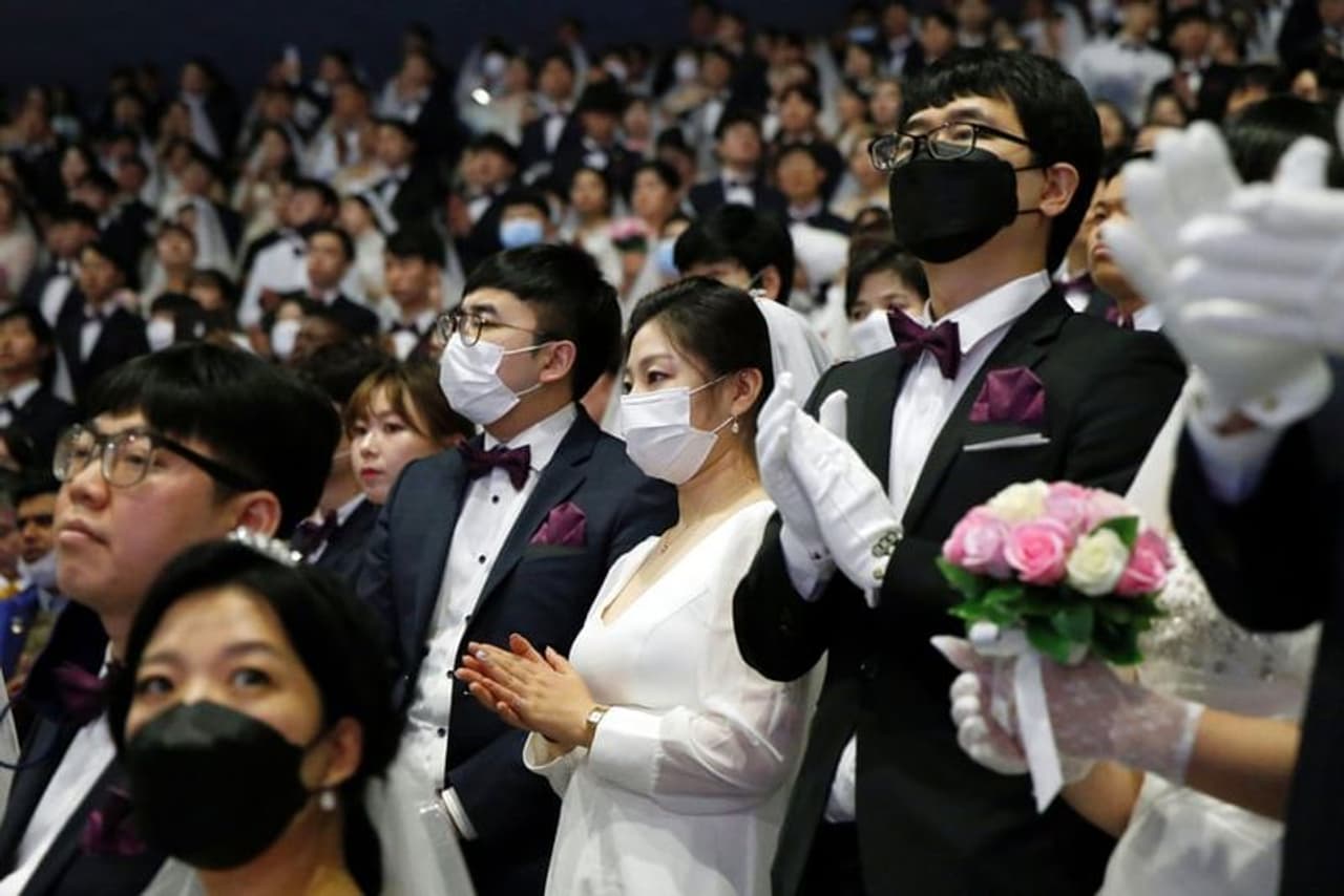 Thousands of couples participated in the mass wedding performed by South Korea’s Unification Church Thousands of couples participated in the mass wedding performed by South Korea’s Unification Church