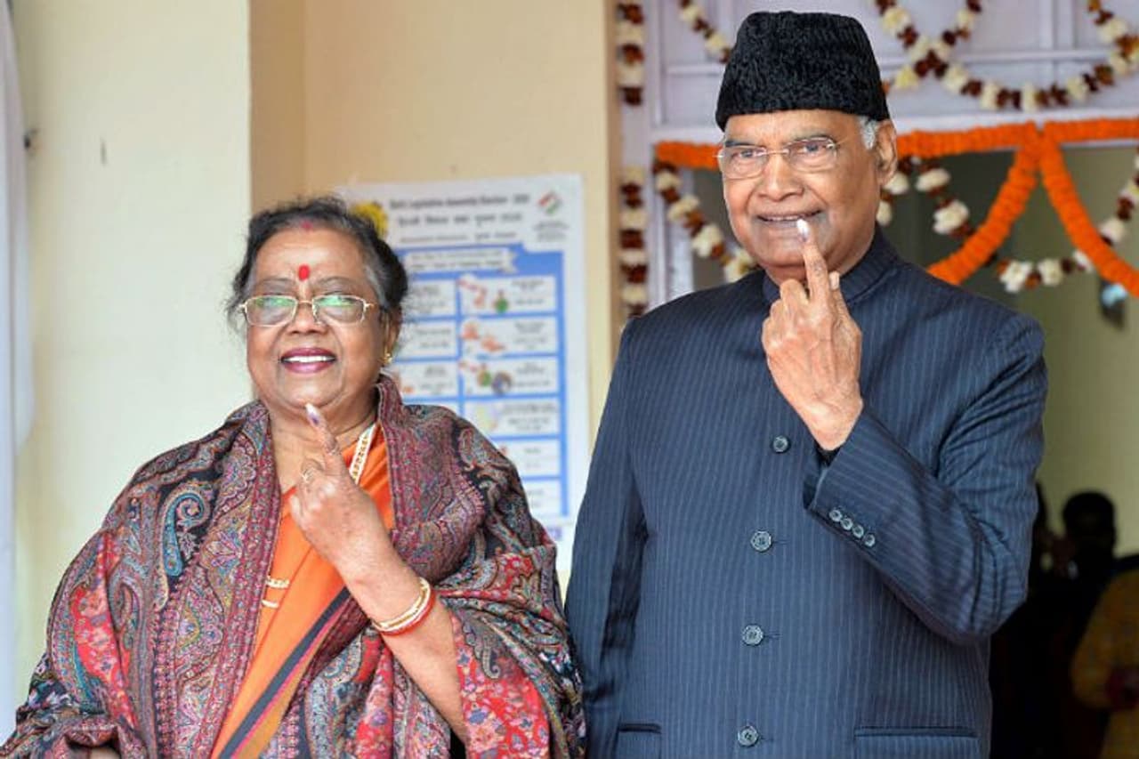 President Ram Nath Kovind and his wife Savita Kovind showing the mark of indelible ink after casting their votes, at a polling booth, at Dr. Rajendra Prasad Kendriya Vidyalaya, Rashtrapati Bhavan complex, in New Delhi on Saturday.