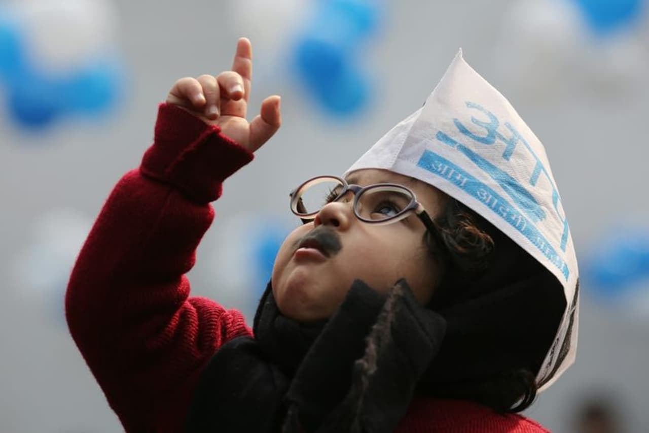 The oath taking ceremony of Arvind Kejriwal as the chief minister for the third consecutive time will have a special guest on February 16. It is none other than the young fan, who dressed up as the AAP chief in his signature style, sporting the moustache and wearing the muffler on counting day of the Delhi election. The oath taking ceremony of Arvind Kejriwal as the chief minister for the third consecutive time will have a special guest on February 16. It is none other than the young fan, who dressed up as the AAP chief in his signature style, sporting the moustache and wearing the muffler on counting day of the Delhi election.