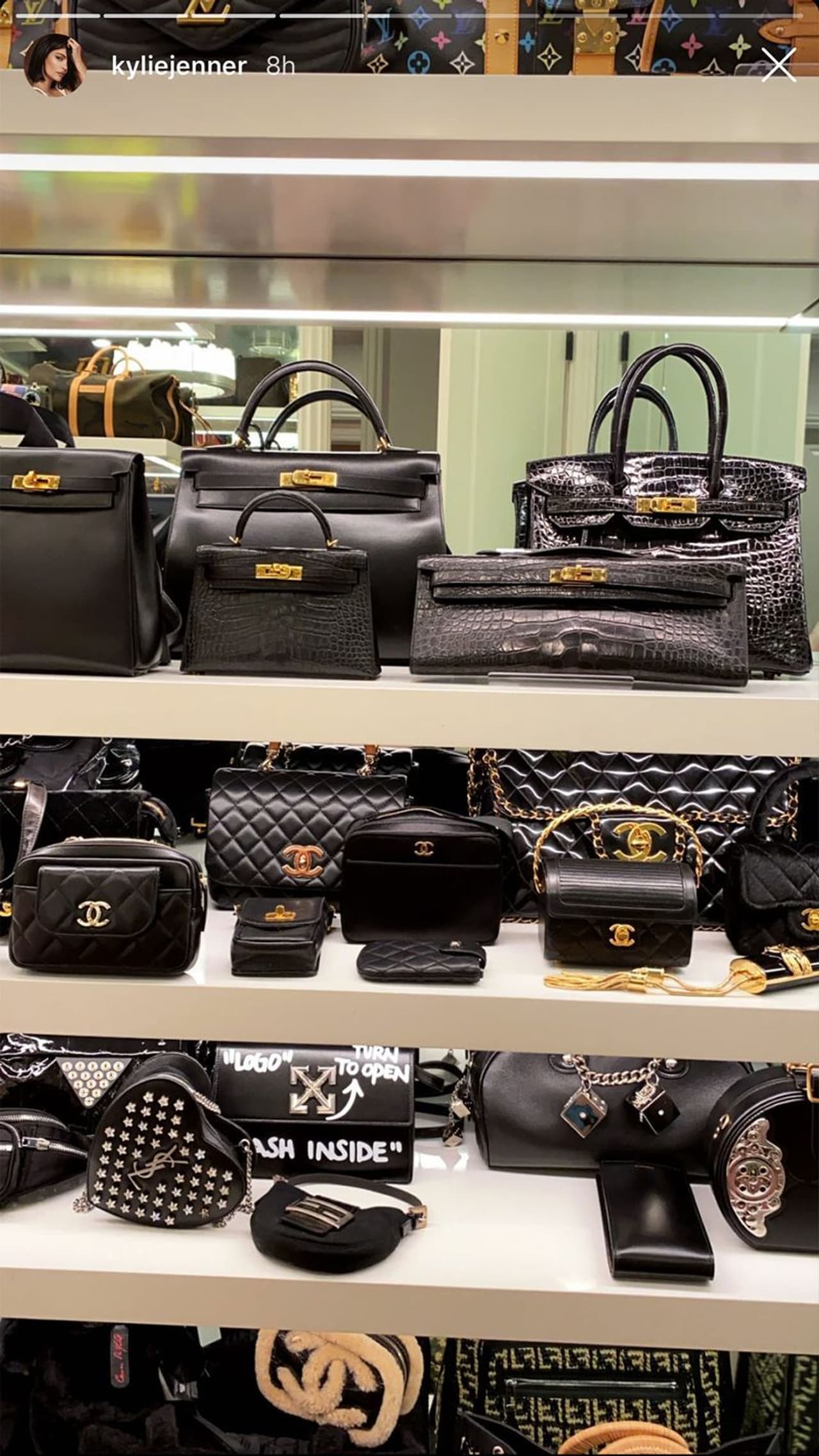 Black beauties: Not only did Kylie organise these purses by color, but also by designer. The top shelf is Hermès, the middle is Chanel and the bottom appears to be mixed, including YSL and Off White. Black beauties: Not only did Kylie organise these purses by color, but also by designer. The top shelf is Hermès, the middle is Chanel and the bottom appears to be mixed, including YSL and Off White.