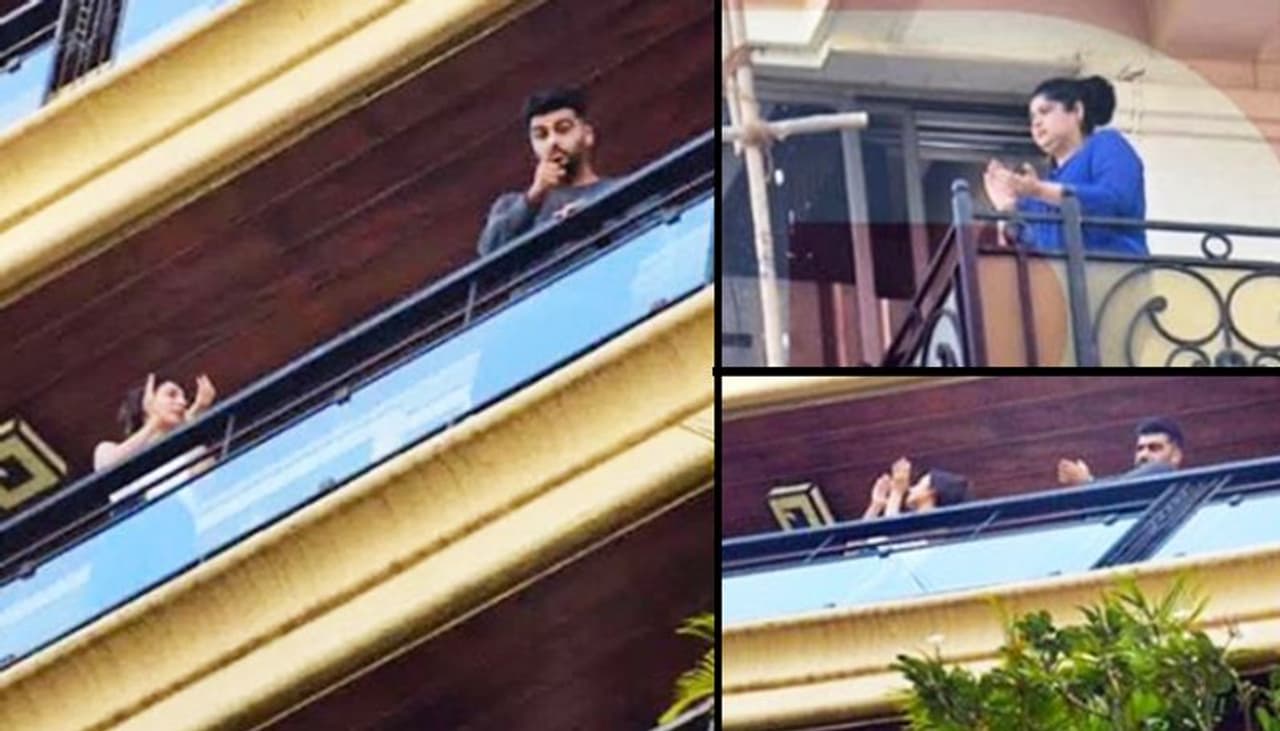 Prominent Bollywood personalities such as Lata Mangeshkar, Amitabh Bachchan, Akshay Kumar and Karan Johar on Sunday came out to their balconies as part of PM Narendra Modi's Janata Curfew initiative to give a shout out to people who have been providing medical and other essential services during the ongoing coronavirus pandemic.