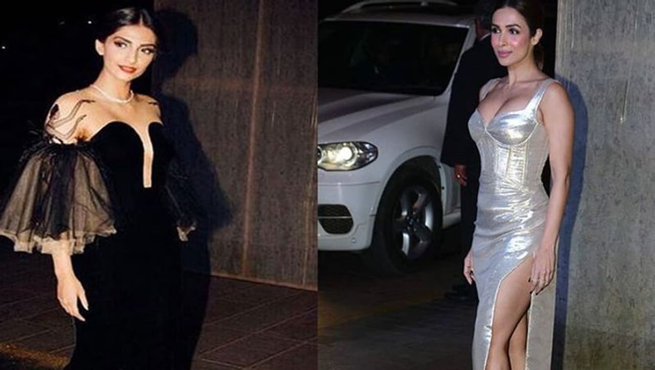 On designer Manish Malhotra's 50th birthday party, which was held in Mumbai, Malaika Arora was enjoying the party with her gals wearing a silver high slit gown. <br /> On designer Manish Malhotra's 50th birthday party, which was held in Mumbai, Malaika Arora was enjoying the party with her gals wearing a silver high slit gown. <br /> 