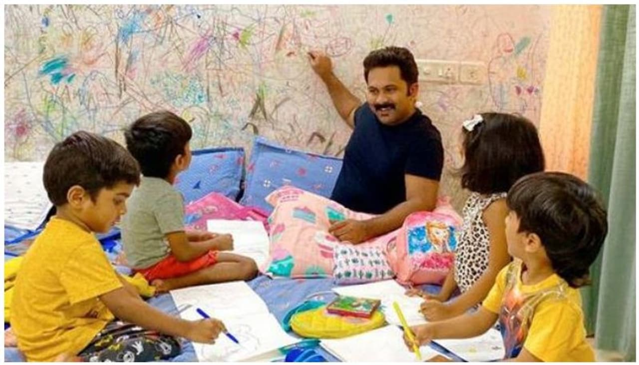 <p>Malayalam actor Aju Varghese has shared a picture of him with his four children</p>