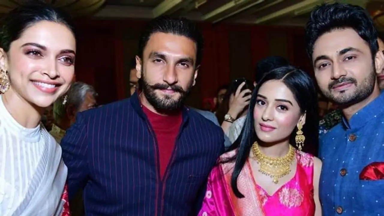 <p>Deepika Padukone and Amrita Rao are now related after a wedding brought them together as family. Deepika Padukone with Ranveer Singh and Amrita Rao with husband RJ Anmol were once spotted at a wedding. <br /> </p> <p>Deepika Padukone and Amrita Rao are now related after a wedding brought them together as family. Deepika Padukone with Ranveer Singh and Amrita Rao with husband RJ Anmol were once spotted at a wedding. <br /> </p>