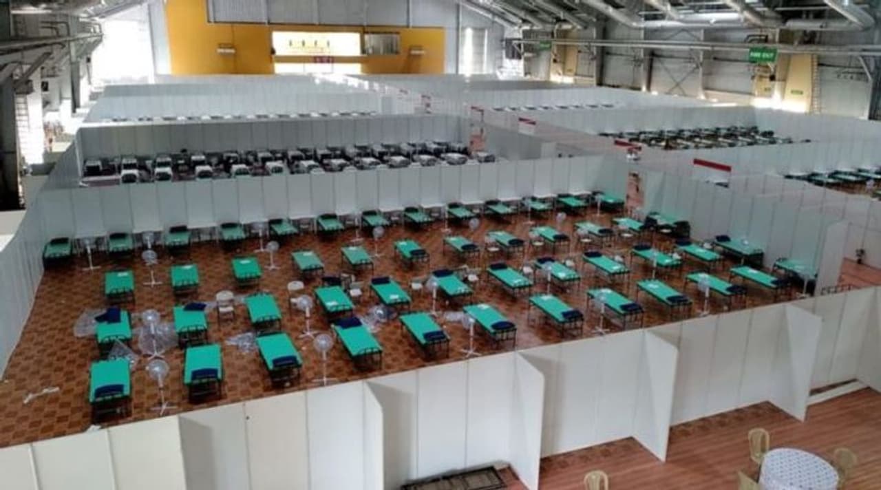 <h1 itemprop="headline">ಕೋವಿಡ್ ಸೋಂಕಿತರಿಗಾಗಿ ಬೆಂಗಳೂರಿನ ನೆಲಮಂಗಲದಲ್ಲಿ ದೇಶದಲ್ಲೇ ಅತಿದೊಡ್ಡ ಕೋವಿಡ್ ಕೇರ್ ಸೆಂಟರ್ ಸೇವೆಗೆ ಸಿದ್ಧವಾಗಿದೆ</h1> <h1 itemprop="headline">ಕೋವಿಡ್ ಸೋಂಕಿತರಿಗಾಗಿ ಬೆಂಗಳೂರಿನ ನೆಲಮಂಗಲದಲ್ಲಿ ದೇಶದಲ್ಲೇ ಅತಿದೊಡ್ಡ ಕೋವಿಡ್ ಕೇರ್ ಸೆಂಟರ್ ಸೇವೆಗೆ ಸಿದ್ಧವಾಗಿದೆ</h1>