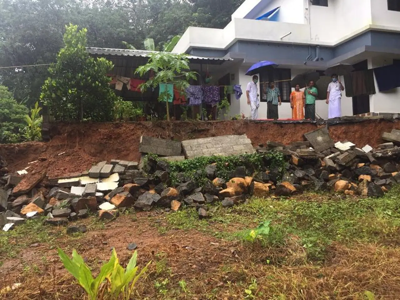 <p> A 62 year old man died after a huge compound wall near his house collapsed and fell on him in Kerala’s Kannur on Thursday (July 29) as heavy rains continued to lash northern districts in the state.</p> <p> A 62 year old man died after a huge compound wall near his house collapsed and fell on him in Kerala’s Kannur on Thursday (July 29) as heavy rains continued to lash northern districts in the state.</p>
