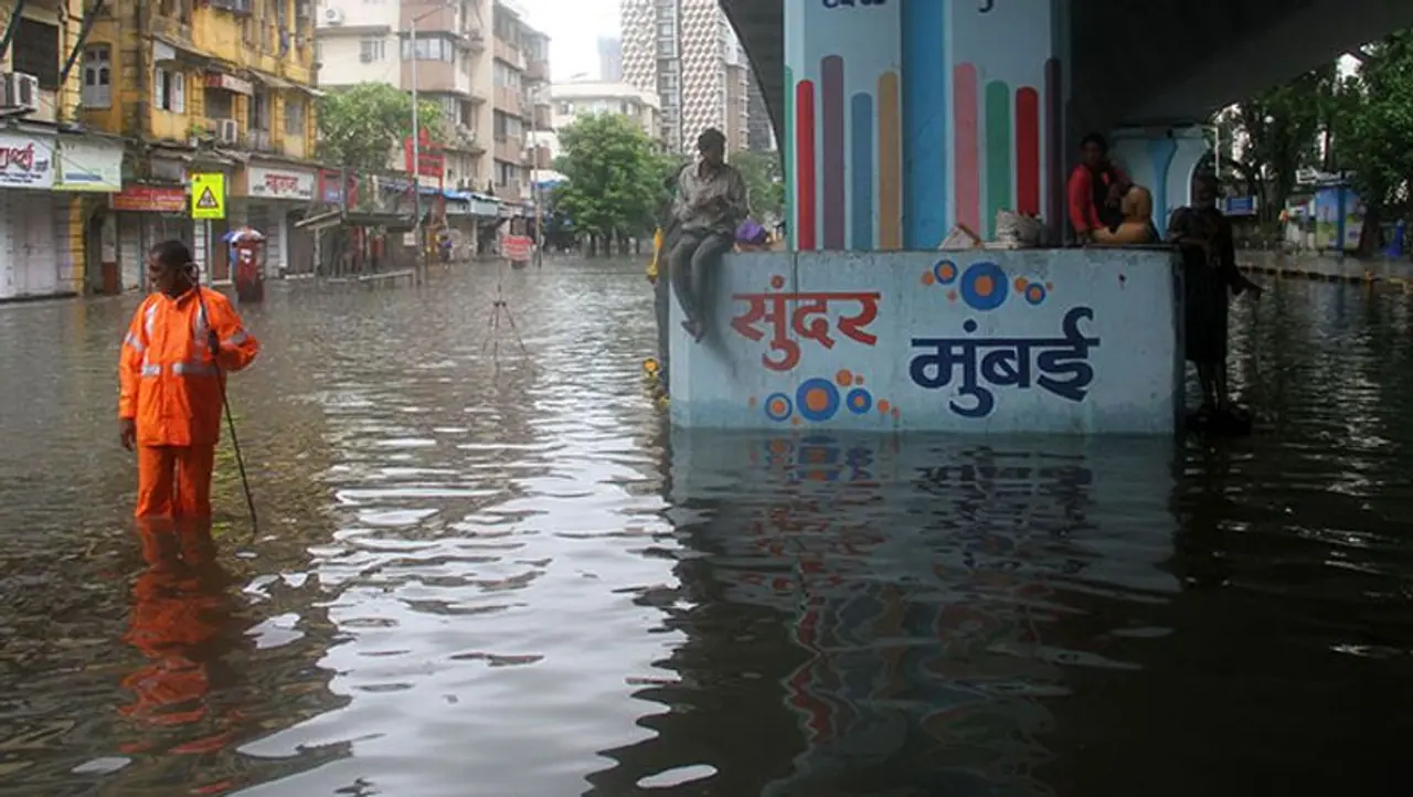 <p> As heavy rains lashed Mumbai and neighbouring areas on Wednesday, Maharashtra chief minister Uddhav Thackeray asked people to stay indoors and venture out only for essential work.</p> <p> As heavy rains lashed Mumbai and neighbouring areas on Wednesday, Maharashtra chief minister Uddhav Thackeray asked people to stay indoors and venture out only for essential work.</p>