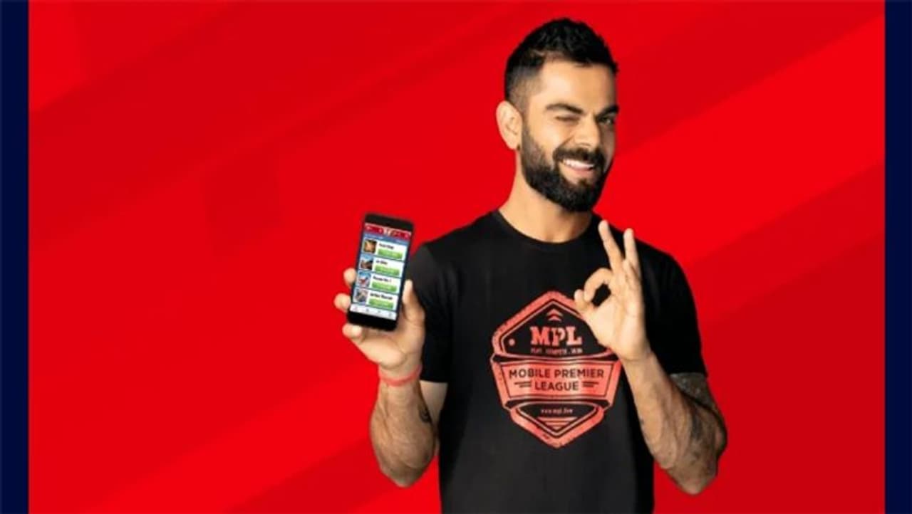 <p>Indian skipper, Virat Kohli has been served a notice by Kerala High Court over a plea to ban online gaming platform, in the state. Along with him, South Indian actor, Aju Varghese, and Bollywood actress, Tamanna Bhatia, have also been served with a similar notice, who endorse a similar brand.</p> <p>Indian skipper, Virat Kohli has been served a notice by Kerala High Court over a plea to ban online gaming platform, in the state. Along with him, South Indian actor, Aju Varghese, and Bollywood actress, Tamanna Bhatia, have also been served with a similar notice, who endorse a similar brand.</p>