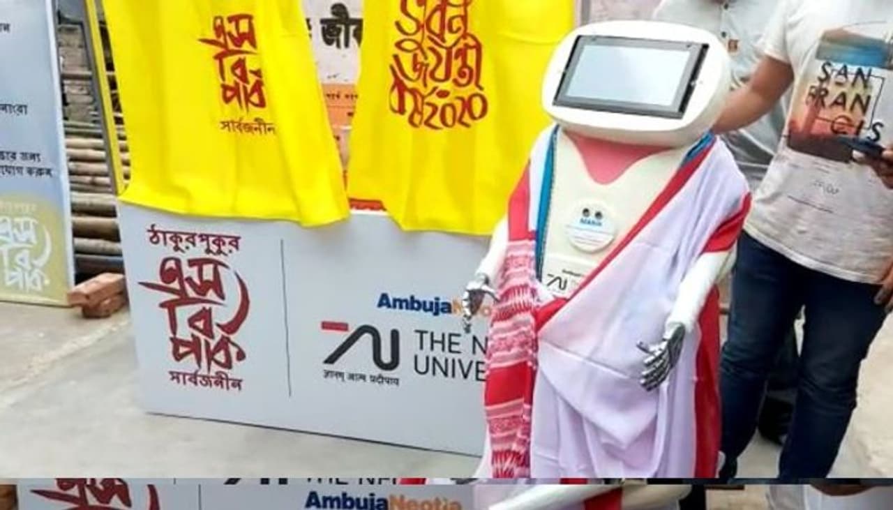 <p>A robot was seen at the entrance of the pandal. If people forget to use sanitiser while entering the pandal, this robot will give visitors sanitiser by hand.</p><p>&nbsp;</p>