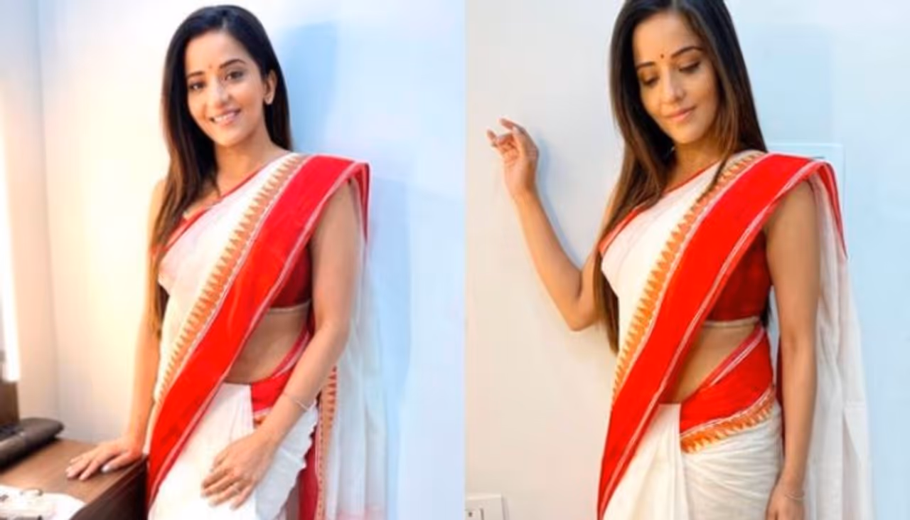 <p>Monalisa brought on the festivity of Durga Puja among fans. She was dressed in white and red fringed sari. The tag of “bong beauty” perfectly matches her looks<br />&nbsp;</p>