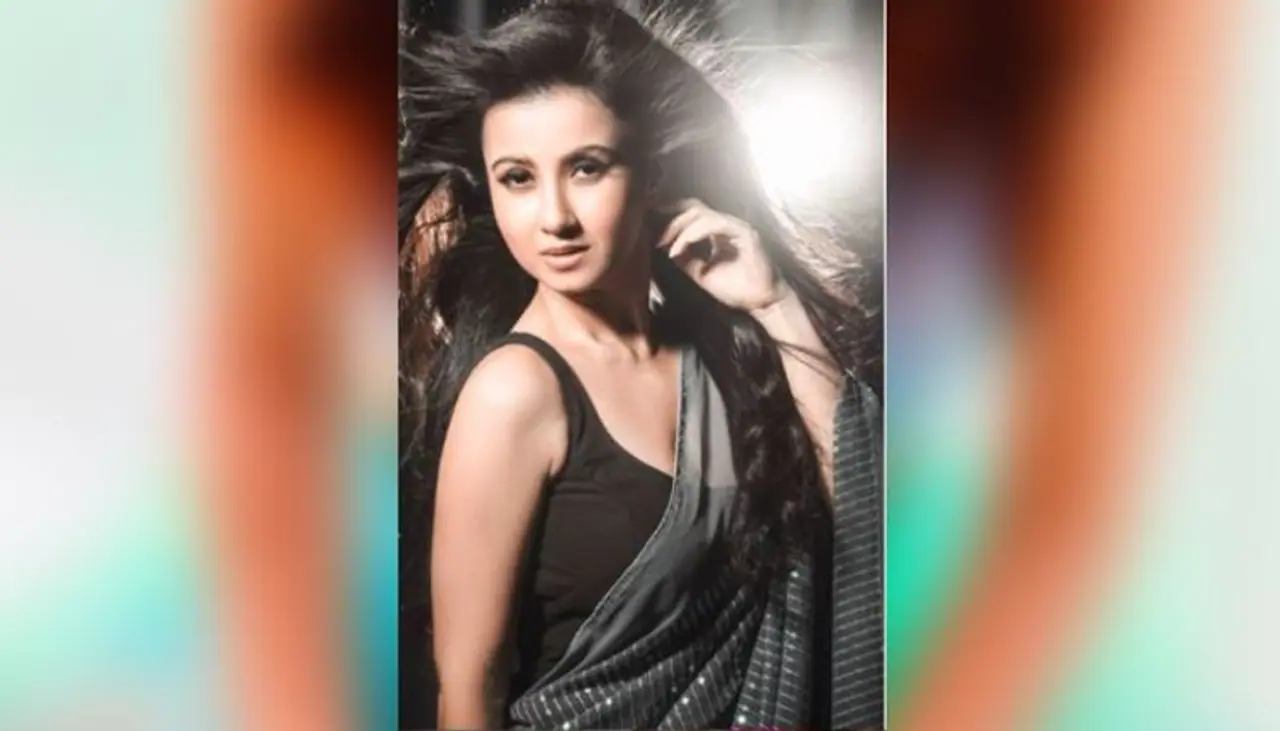 <p>The actress is a fashionista and is always seen following latest trends. Monami was recently caught wearing a black chiffon saree where she looked like a fairy.</p>