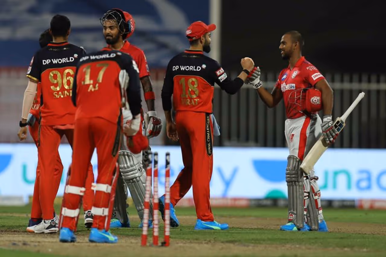 <p style="text align: justify;">Match 31 at Sharjah came as a surprise. Royal Challengers Bangalore, who were in terrific form clashed with one of the poor performers of this season Kings XI Punjab, lost by eight wickets. KXIP have won just two matches this season and both have been against RCB. <strong>Let’s look at some of the talking points of the match.</strong></p> <p style="text align: justify;">Match 31 at Sharjah came as a surprise. Royal Challengers Bangalore, who were in terrific form clashed with one of the poor performers of this season Kings XI Punjab, lost by eight wickets. KXIP have won just two matches this season and both have been against RCB. <strong>Let’s look at some of the talking points of the match.</strong></p>