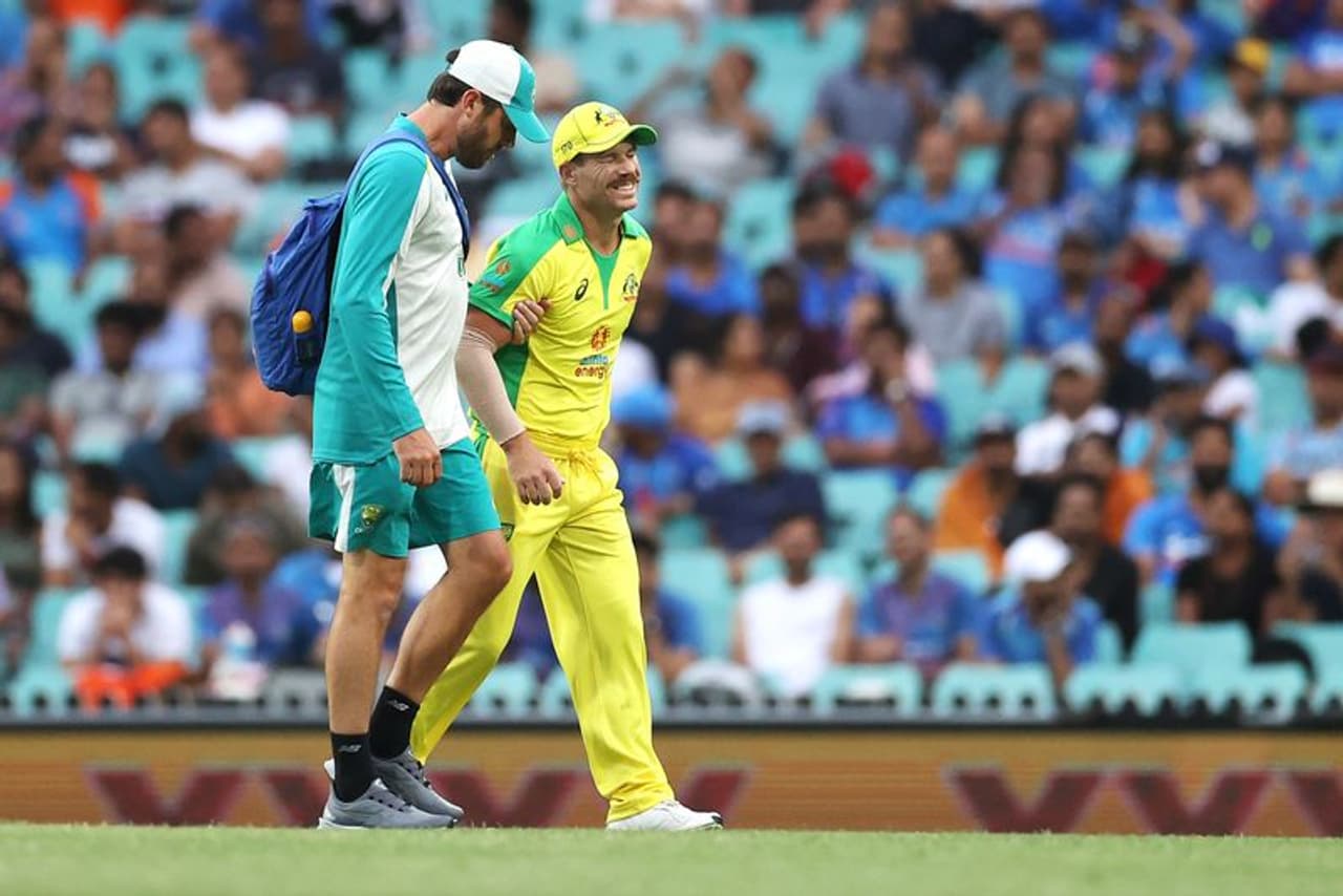 <p>In what could be considered a significant setback for Australia, opener David Warner has been ruled out of the remaining limited overs matches against India, after suffering a groin injury during the second ODI on Sunday. Also, pacer Pat Cummins has been rested for the same length, citing fitness for the upcoming four Test series, for the Border Gavaskar Trophy.</p> <p>In what could be considered a significant setback for Australia, opener David Warner has been ruled out of the remaining limited overs matches against India, after suffering a groin injury during the second ODI on Sunday. Also, pacer Pat Cummins has been rested for the same length, citing fitness for the upcoming four Test series, for the Border Gavaskar Trophy.</p>