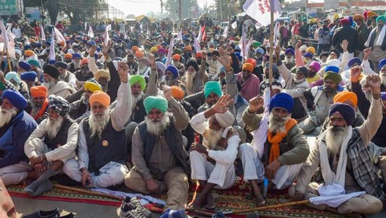 <p>On a chilly Monday morning, escalating their agitation against the Centre's new agri laws, farmers began their day long 'relay' hunger strike at all sites of protest on Delhi's borders with Haryana and Uttar Pradesh.</p> <p>On a chilly Monday morning, escalating their agitation against the Centre's new agri laws, farmers began their day long 'relay' hunger strike at all sites of protest on Delhi's borders with Haryana and Uttar Pradesh.</p>