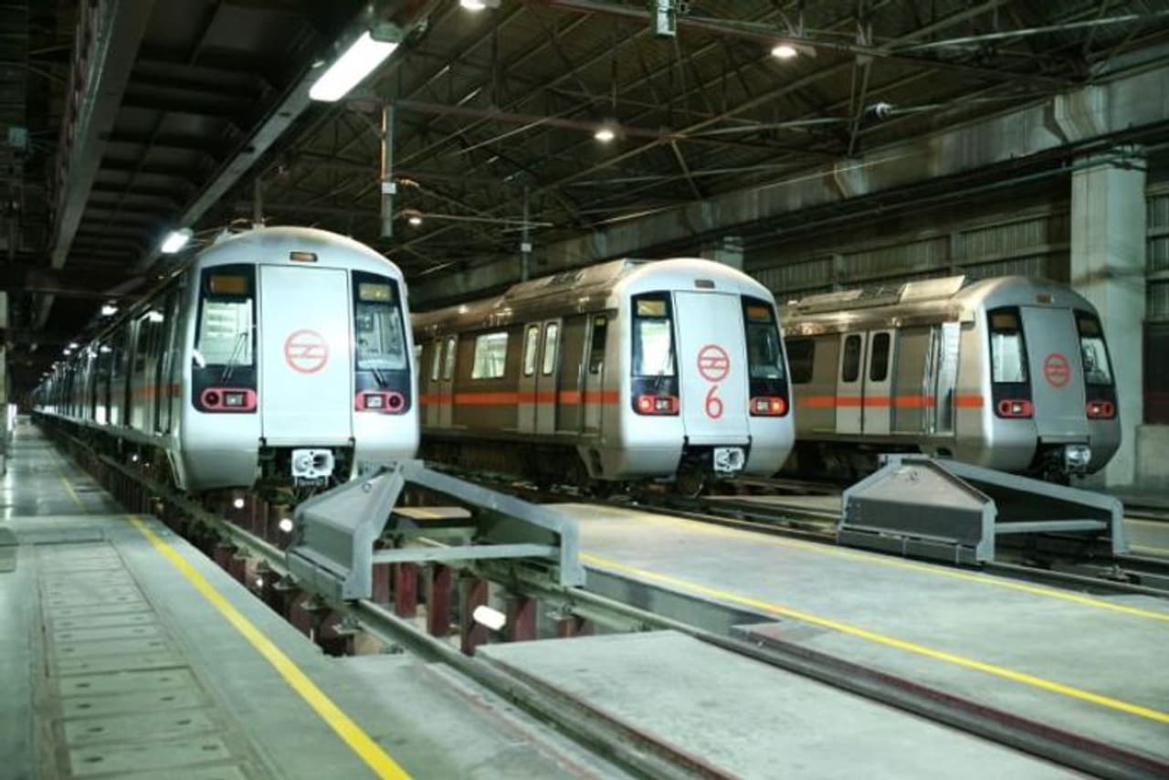 <p>The driverless train will be run on the Magenta Line which connects Janakpuri West in Delhi to Botanical Garden in Noida, Uttar Pradesh.<br /> </p><p>The 37 kilometre long railway line has 25 stations, out of which 10 are elevated and rest 15 are underground. <br /> </p><p>The Delhi Metro Rail Corporation, which completes 18 years of service, announced the launch of the fully automated driverless train service on Thursday evening.</p> <p>The driverless train will be run on the Magenta Line which connects Janakpuri West in Delhi to Botanical Garden in Noida, Uttar Pradesh.<br /> </p><p>The 37 kilometre long railway line has 25 stations, out of which 10 are elevated and rest 15 are underground. <br /> </p><p>The Delhi Metro Rail Corporation, which completes 18 years of service, announced the launch of the fully automated driverless train service on Thursday evening.</p>