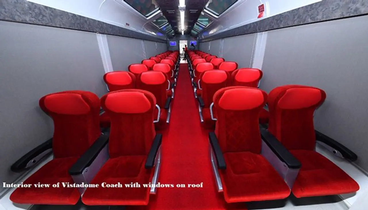<p>Last week, the newly built coach successfully completed the oscillation trial run at the 180 kmph in the Kota division of West Central Railway. <br /> </p><p>* A standout feature of the vistadome tourist coach is its large glass windows and glass roof that boast of electrically controlled opalescence<br /> </p><p>* The vistadome tourist coach has a larger viewing area and an observation lounge which includes a rooftop glass with 44 seats for passengers with rotation up to 180 degrees.</p> <p>Last week, the newly built coach successfully completed the oscillation trial run at the 180 kmph in the Kota division of West Central Railway. <br /> </p><p>* A standout feature of the vistadome tourist coach is its large glass windows and glass roof that boast of electrically controlled opalescence<br /> </p><p>* The vistadome tourist coach has a larger viewing area and an observation lounge which includes a rooftop glass with 44 seats for passengers with rotation up to 180 degrees.</p>